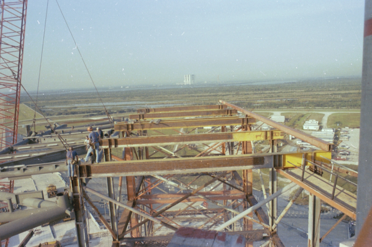 Medium-format photograph of RSS Bottom Truss lift by Wilhoit, viewed from the FSS, showing Falsework which will support the Bottom Truss and all of the rest of the RSS as it is being constructed. Photo Credit: Gene Hajdaj.